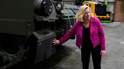 Secretary of the Army Christine Wormuth looks over the latest version of the M1A2 Abrams main battle tank as she tours the Joint Systems Manufacturing Center, Thursday, Feb. 16, 2023, in Lima, Ohio.