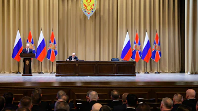 Russian President Vladimir Putin delivers his speech during a meeting of the Federal Security Service (FSB) board as Federal Security Service (FSB) director Alexander Bortnikov sits next in Moscow, Russia, Tuesday, Feb. 28, 2023.