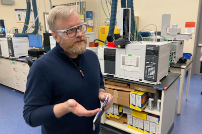 Ben Clark, senior vice president of engineering of Inpria, talks to journalists at the company's lab in Corvallis, Ore., on March 3, 2023. Inpria is developing a method to make semiconductor chips have greater functionality. Oregon wants to attract more semiconductor-related businesses to Oregon and state lawmakers are considering a bill that would allow the governor to expand urban growth boundaries for chip factories.