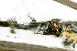 This photo provided KSTP, emergency personnel respond to the scene of a train derailment early Thursday, March 30, 2023 in Raymond, Min.