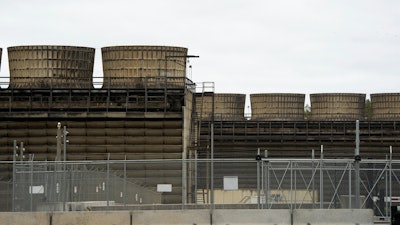 Cooling towers release heat generated by boiling water reactors at Xcel Energy's Nuclear Generating Plant on Oct. 2, 2019, in Monticello, Minn.