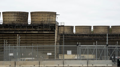 Cooling towers release heat generated by boiling water reactors at Xcel Energy's Nuclear Generating Plant on Oct. 2, 2019, in Monticello, Minn.