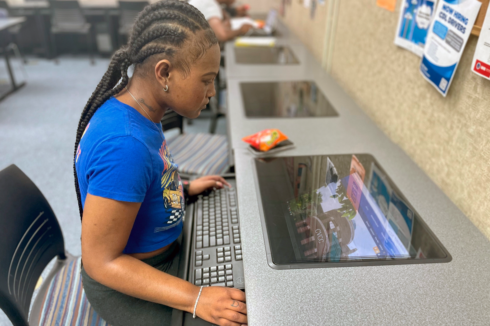 Oryanan Lewis works in the computer lab at Chattahoochee Valley Community College in Phenix City, Ala., on Feb. 23, 2023.