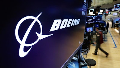 The Boeing logo appears above a trading post on the floor of the New York Stock Exchange on March 11, 2019.