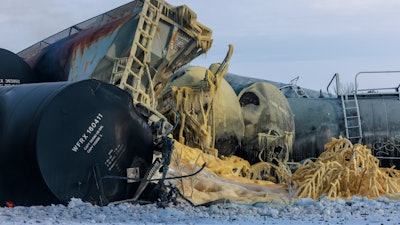Train cars pile up after a BNSF freight train derailed on March 30, 2023, near Raymond, Minn.