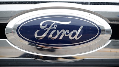 The Ford company logo is pictured, Oct. 20, 2019, at a Ford dealership in Littleton, Colo.