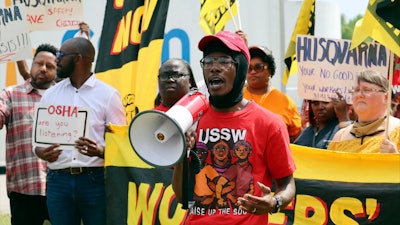 Sersie Cobb, a forklift operator, speaks at a strike outside a Ryder System Inc. warehouse in Columbia, S.C., Tuesday, April 4, 2023.
