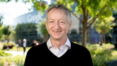 Computer scientist Geoffrey Hinton, who studies neural networks used in artificial intelligence applications, poses at Google's Mountain View, Calif, headquarters on Wednesday, March 25, 2015.