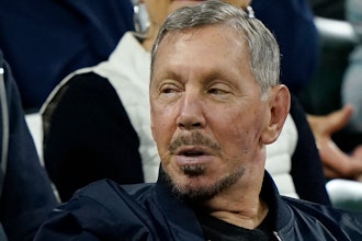 Larry Ellison, chairman of Oracle Corporation and chief technology officer, watches from the stands at the BNP Paribas Open tennis tournament Wednesday, Oct. 13, 2021, in Indian Wells, Calif.