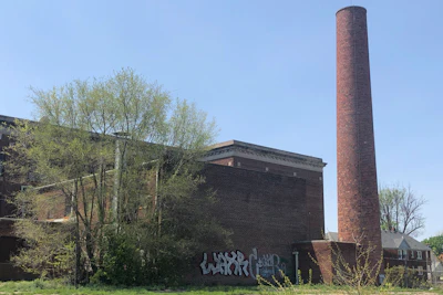 The abandoned Ford School in Highland Park, Mich., is seen on May 9, 2023. The school is one of the many abandoned buildings in the small Detroit enclave.