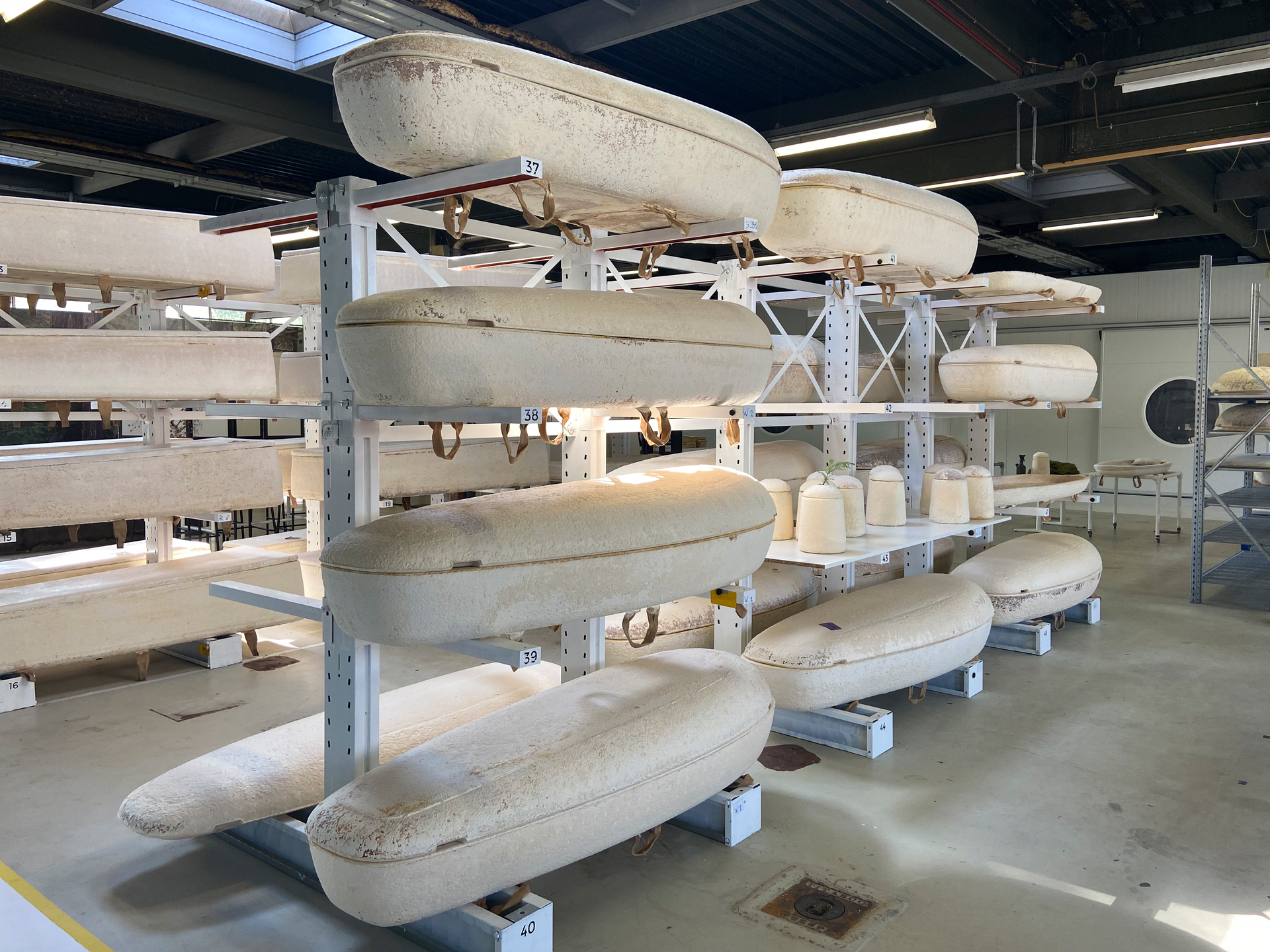 Dutch startup Loop Biotech's cocoon-like coffins, grown from local mushrooms and up-cycled hemp fibres, designed to dissolve into the environment amid growing demand for more sustainable burial practices, are stored in Delft, Netherlands, Monday, May 22, 2023.
