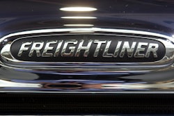 The emblem of Freightliner is pictured on a truck in Hanover, northern Germany, Sept. 23, 2008. The U.S. government’s highway safety agency is investigating complaints that the automatic emergency braking on big Freightliner trucks can stop unexpectedly for no apparent reason. The agency says in documents posted on its website Tuesday, May 30, 2023 that it has 18 complaints from owners alleging that brakes on Freightliner Cascadia trucks can come on without an obstacle in the road.