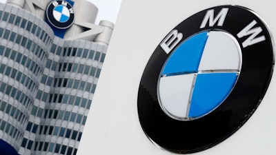 The logo of the German car manufacturer BMW is displayed on the headquarters in Munich, Germany, March 21, 2018.
