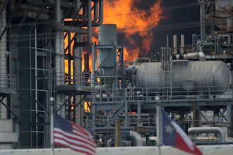 A fire burns at a Shell chemical facility in Deer Park, Friday, May 5, 2023 east of Houston.