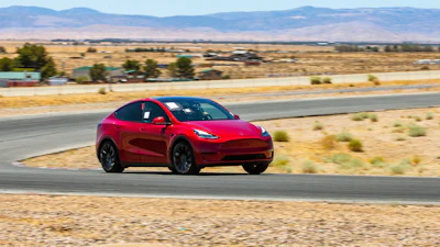 This photo provided by Edmunds, shows the 2023 Tesla Model Y Performance, a compact SUV with acceleration that can rival a number of dedicated sports cars.