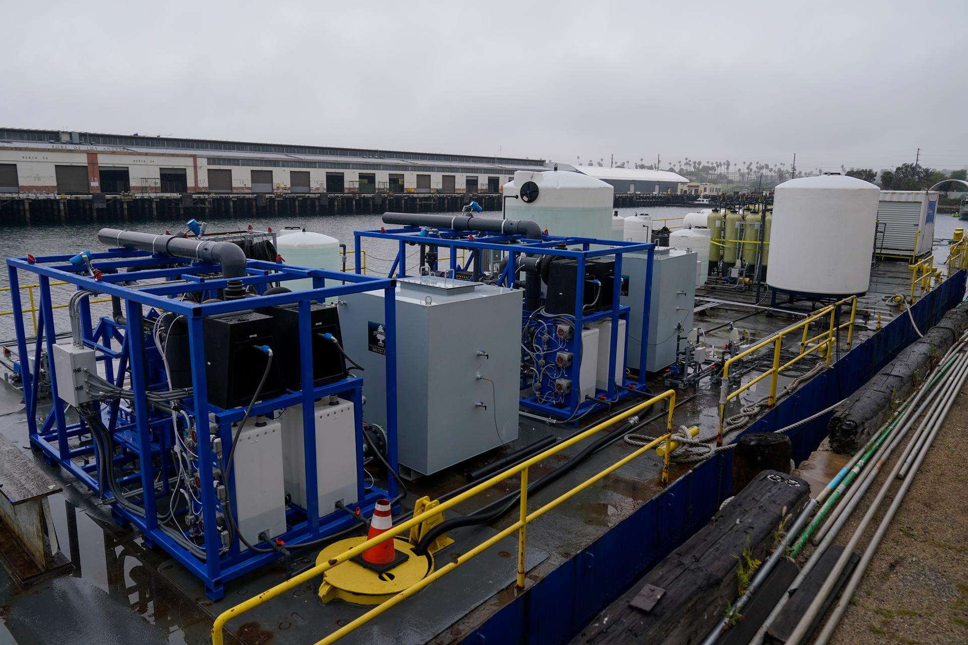 A demonstration site of a seawater-based carbon removal system is set up on a barge, Wednesday, April 12, 2023, in San Pedro, Calif.