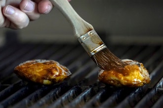 Chef Zach Tyndall prepares Good Meat's cultivated chicken at the Eat Just office in Alameda, Calif., Wednesday, June 14, 2023.