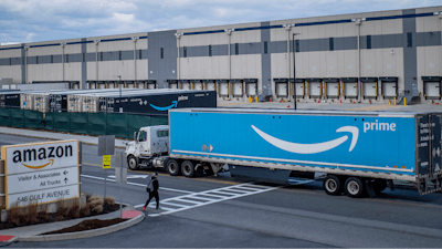 A truck arrives at an Amazon warehouse in Staten Island, New York, April 1, 2022.