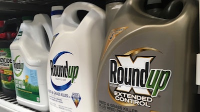 Containers of Roundup sit on a store shelf on Feb. 24, 2019, in San Francisco. Two companies that sell top brands of household weedkiller will pay nearly $7 million for allegedly making false and misleading claims regarding the safety of their products as part of a settlement with the New York Attorney General's office on Thursday, June 15, 2023.