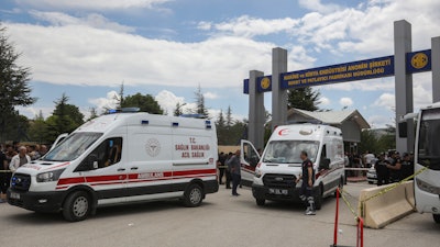 Ambulances park outside a compound of the state-owned Mechanical and Chemical Industry Corporation on the outskirts of Ankara, Turkey, Saturday, June 10, 2023.
