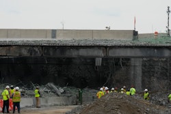 Crews work at the scene of a collapsed section of Interstate 95 in Philadelphia, June 14, 2023.