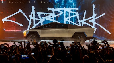 The Tesla Cybertruck is unveiled at Tesla's design studio Thursday, Nov. 21, 2019, in Hawthorne, Calif.