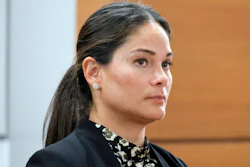 Melina Hipskind, from McDonalds USA, stands at the defense table as a verdict awarding Philana Holmes and Humberto Caraballo Estevez $800,000 on behalf of their daughter Olivia Caraballo, now 8, is read at the Broward County Courthouse in Fort Lauderdale on Wednesday, July 19, 2023.