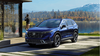 This photo provided by Honda shows the 2023 Honda CR-V, a compact SUV that was recently redesigned and now offers a hybrid engine in the mid to upper trim levels.