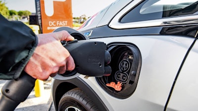 This photo provided by General Motors shows the combined charging system or CCS plug.