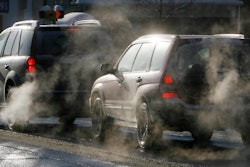 Cars give off exhaust fumes in Montpelier, Vt., Monday, Jan. 26, 2009.