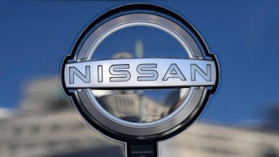 A Nissan logo is seen on a car at its showroom in Tokyo, Feb. 21, 2023.
