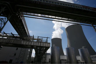 Equipment frames the cooling towers of the Temelin nuclear power plant near the town of Tyn nad Vltavou, Czech Republic, on Thursday, June 25, 2015.