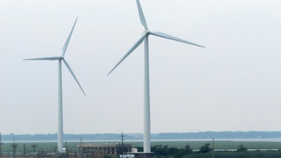 Land-based windmills in Atlantic City turn on July 20, 2023.
