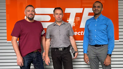 Patrick Bertram, principal engineer molding simulation; Alexander Stokowski, director Engineering Transformation, holding the first ECU project to be CT measured and digitalized; and Tabrez Ahmed Ajaz, manager COE GD metrology.