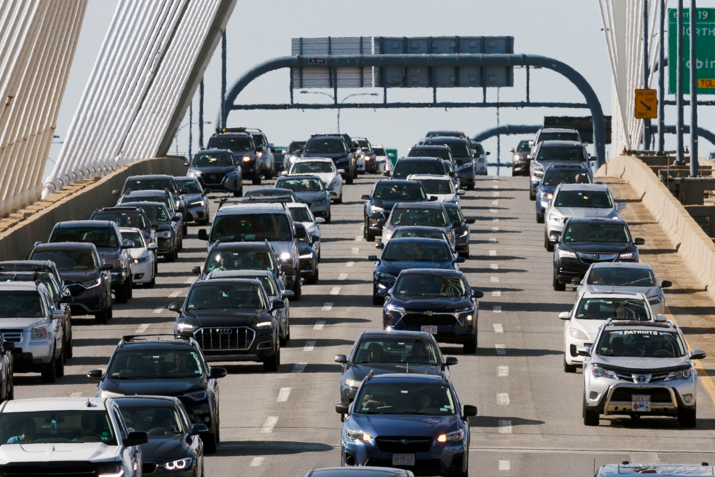 Heavy traffic heads south on Interstate 93 over the Zakim Bridge, Friday, Sep. 1, 2023, in Boston. Cars are getting an “F” in data privacy.