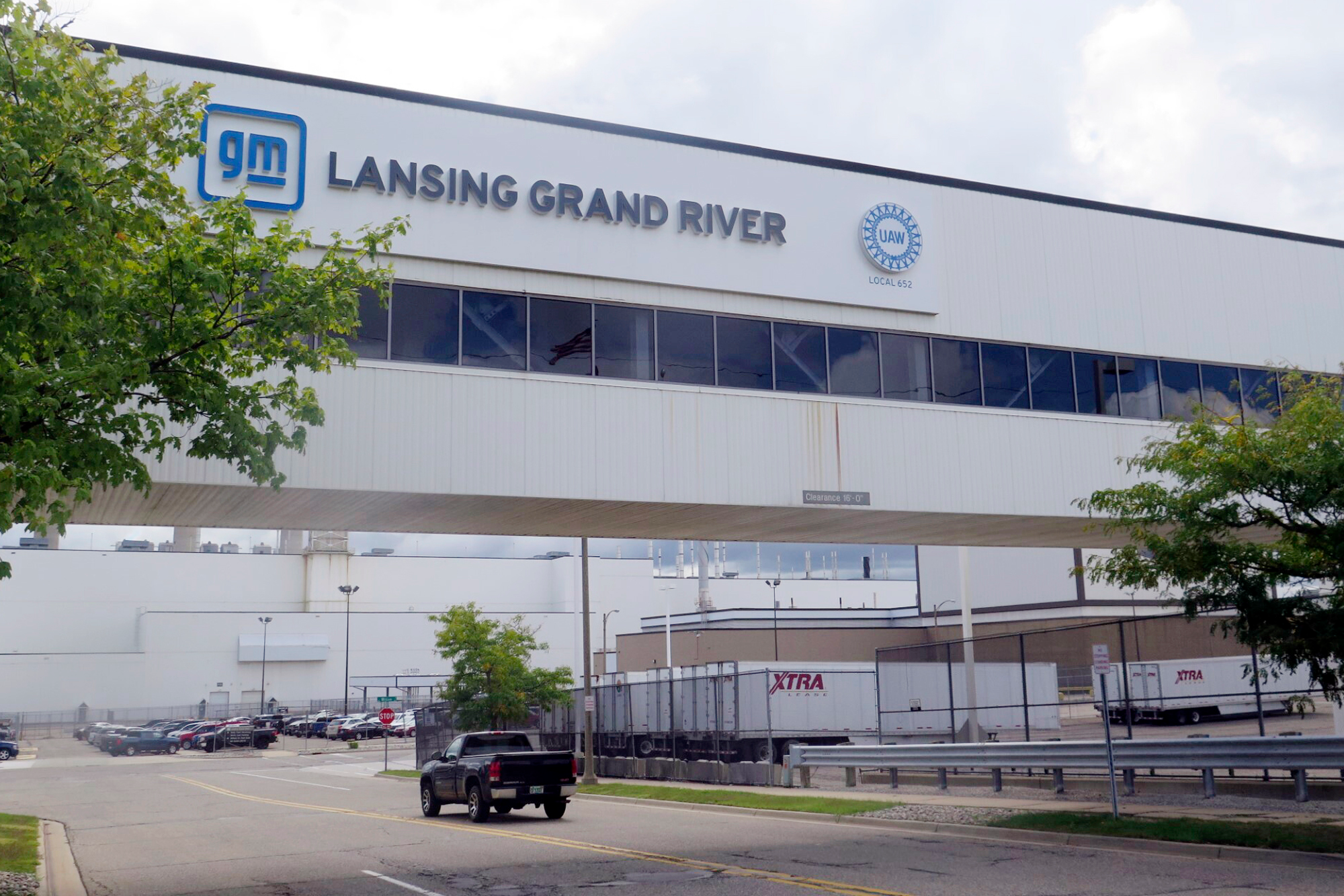 A vehicle enters General Motor’s Lansing Grand River Assembly plant, Tuesday, Sept. 12, 2023, in Lansing, Mich., just days before auto workers could potentially strike due failed contract negotiations.