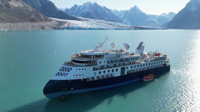 A view of the Ocean Explorer, a Bahamas-flagged Norwegian cruise ship with 206 passengers and crew, which has run aground in northwestern Greenland is pictured on Tuesday, Sept. 12, 2023.
