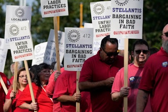 United Auto Workers march outside the Stellantis North American Headquarters, Wednesday, Sept. 20, 2023, in Auburn Hills, Mich.