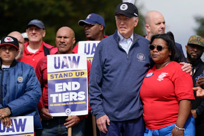 President Joe Biden joins striking United Auto Workers on the picket line, Tuesday, Sept. 26, 2023, in Van Buren Township, Mich.