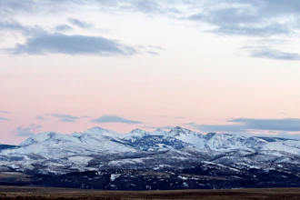 In this March 25, 2016, file photo, the sun sets over the Badger-Two Medicine area near Browning, Mont.