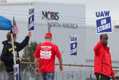 United Auto Workers union members strike for improved compensation outside of the Stellantis Toledo Assembly Complex on Thursday, Sept. 28, 2023 in Toledo, Ohio.
