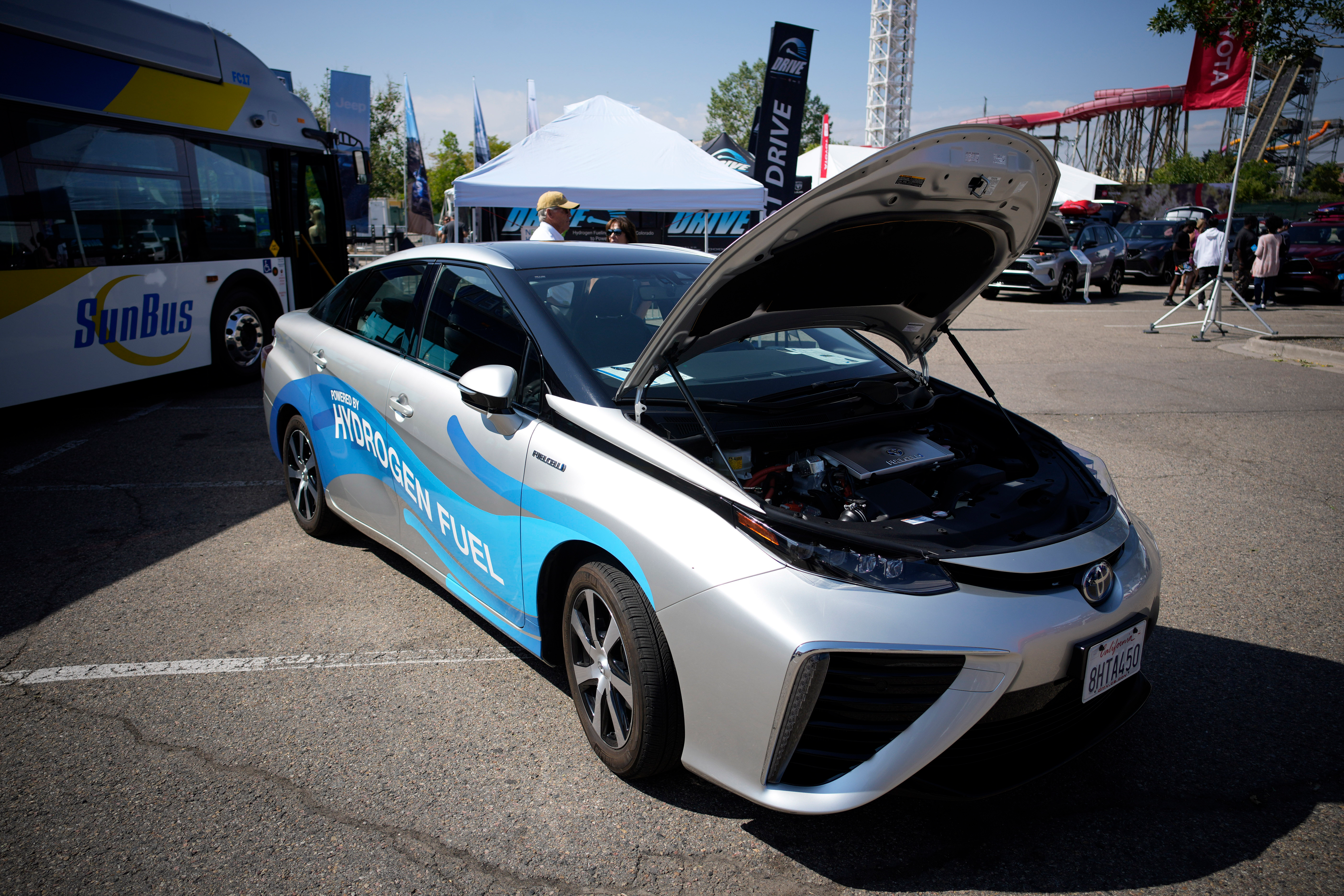 A 2021 Toyota Prius that runs on a hydrogen fuel cell sits on display at the Denver auto show on Sept. 17, 2021, at Elitch's Gardens in downtown Denver.