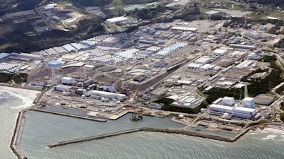 This aerial view shows the Fukushima Daiichi nuclear power plant in Fukushima, northern Japan, on Aug. 24, 2023, shortly after its operator Tokyo Electric Power Company Holdings TEPCO began releasing its first batch of treated radioactive water into the Pacific Ocean.