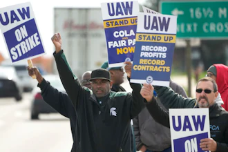 United Auto Workers members walk the picket line during a strike at the Stellantis Sterling Heights Assembly Plant, in Sterling Heights, Mich., Monday, Oct. 23, 2023.