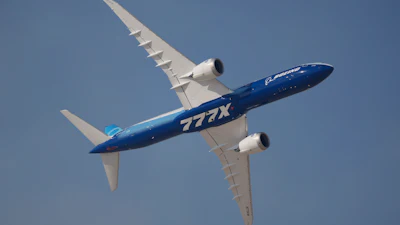 A Boeing 777X performs during the opening day of the Dubai Air Show, United Arab Emirates, Monday, Nov. 13, 2023.