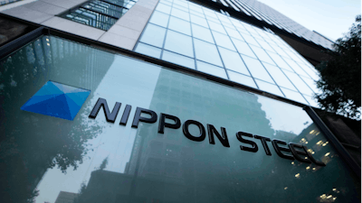 Nippon Steel Corporation's logo is displayed on a sign outside its headquarters in Tokyo on Nov. 26, 2021. Nippon Steel Corp. has dropped its lawsuit against Toyota Motor Corp. over a patent for a technology used in electric motors, saying wrangling among Japanese companies was not beneficial to keep the nation competitive, according to Japan’s top steelmaker's statement Thursday, Nov. 2, 2023.