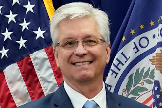 Federal Reserve Board of Governors member Christopher Waller poses for a photo on May 23, 2022, in Washington. Waller said Tuesday, Nov. 28, 2023 that the U.S. economy is cooling and inflation is steadily slowing, suggesting that the Fed's interest rate policies are succeeding in getting price increases back to the central bank's 2%.