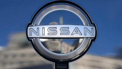 A Nissan logo is seen on a car at its showroom in Tokyo on Feb. 21, 2023.