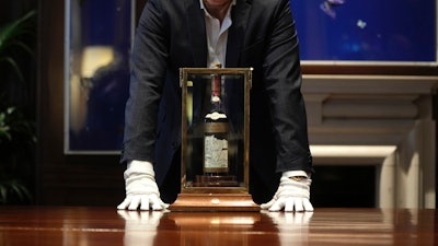 A bottle of Macallan Adami 1926 whisky displayed during a media preview, Sotheby's auction house, London, Oct. 19, 2023. The bottle recently sold for almost $2.7 million.