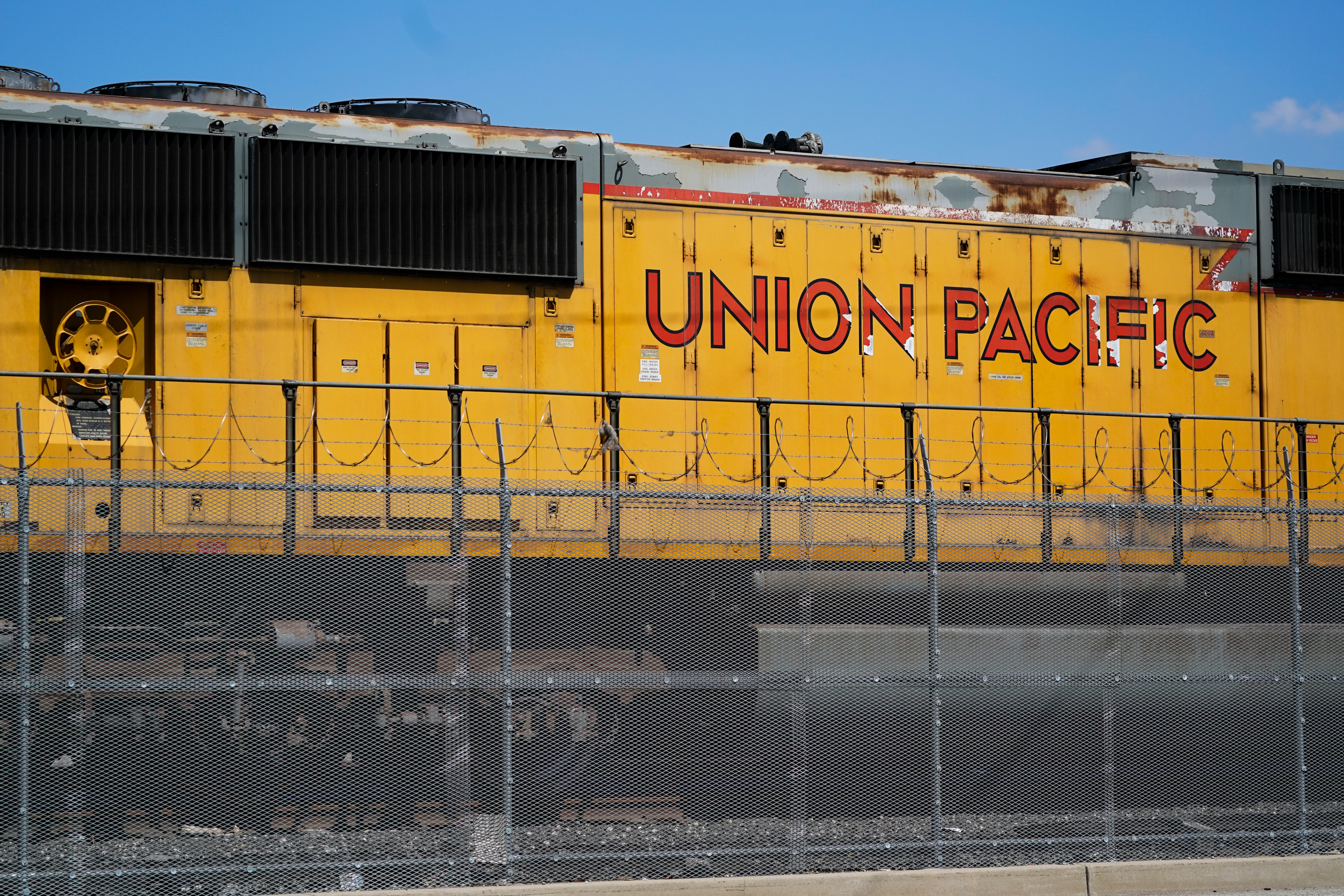 A Union Pacific train engine sits in a rail yard on Wednesday, Sept. 14, 2022, in Commerce, Calif.
